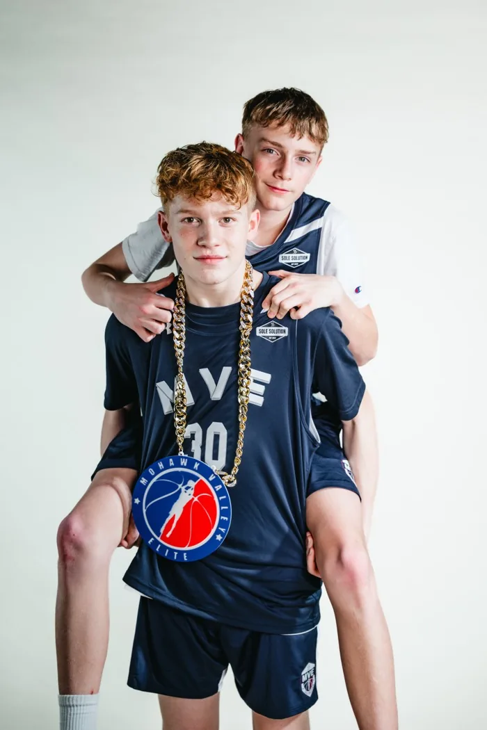 One MVE player giving a teammate a piggyback ride at 2026 Media Day