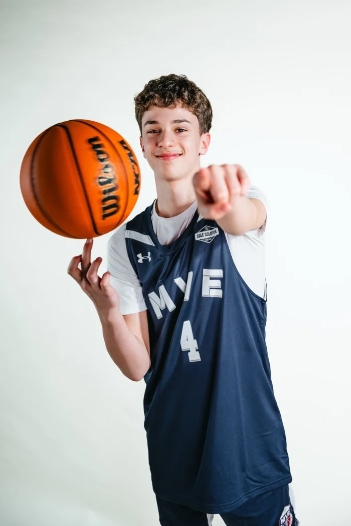MVE player spinning a basketball on a fingertip at 2026 Media Day